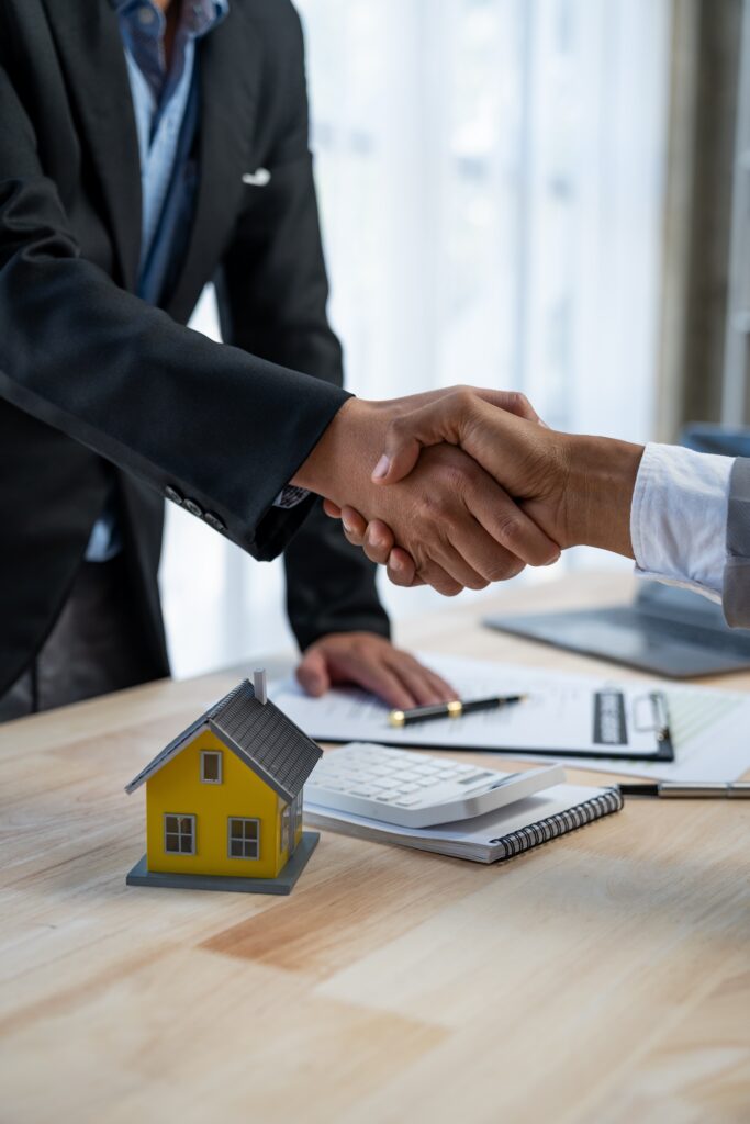 Handshake over a housing contract