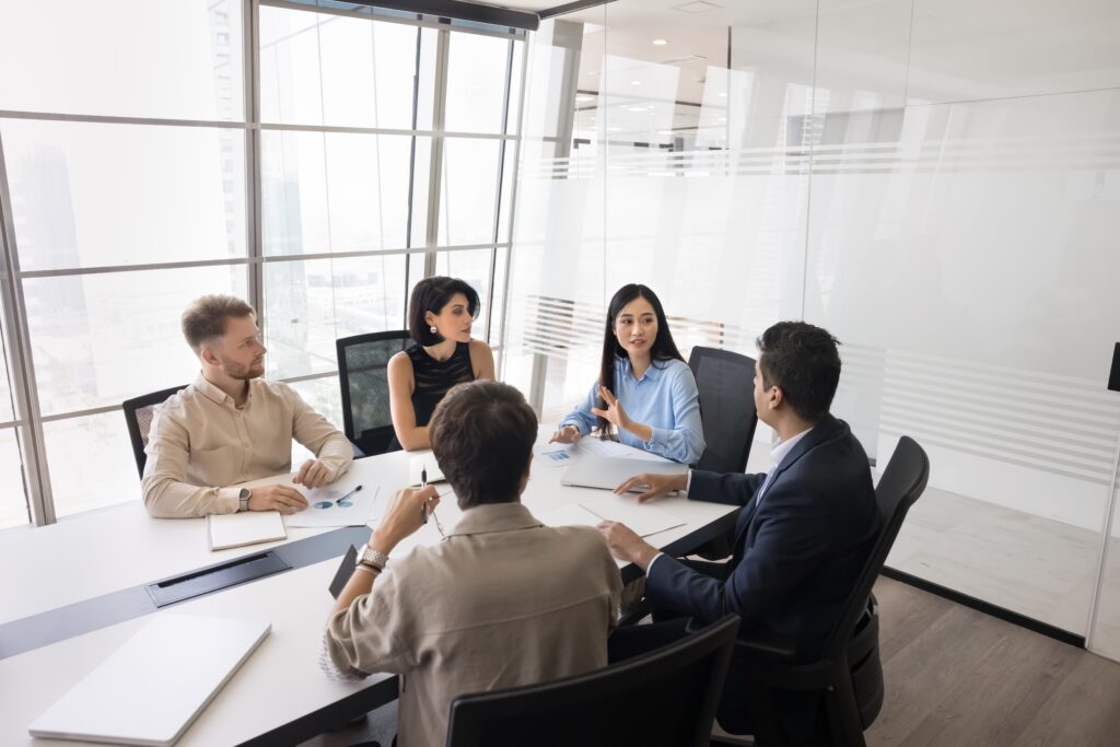 Stakeholders meeting around a table.