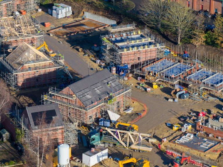 Construction development illustrating bonds for contractors and developers